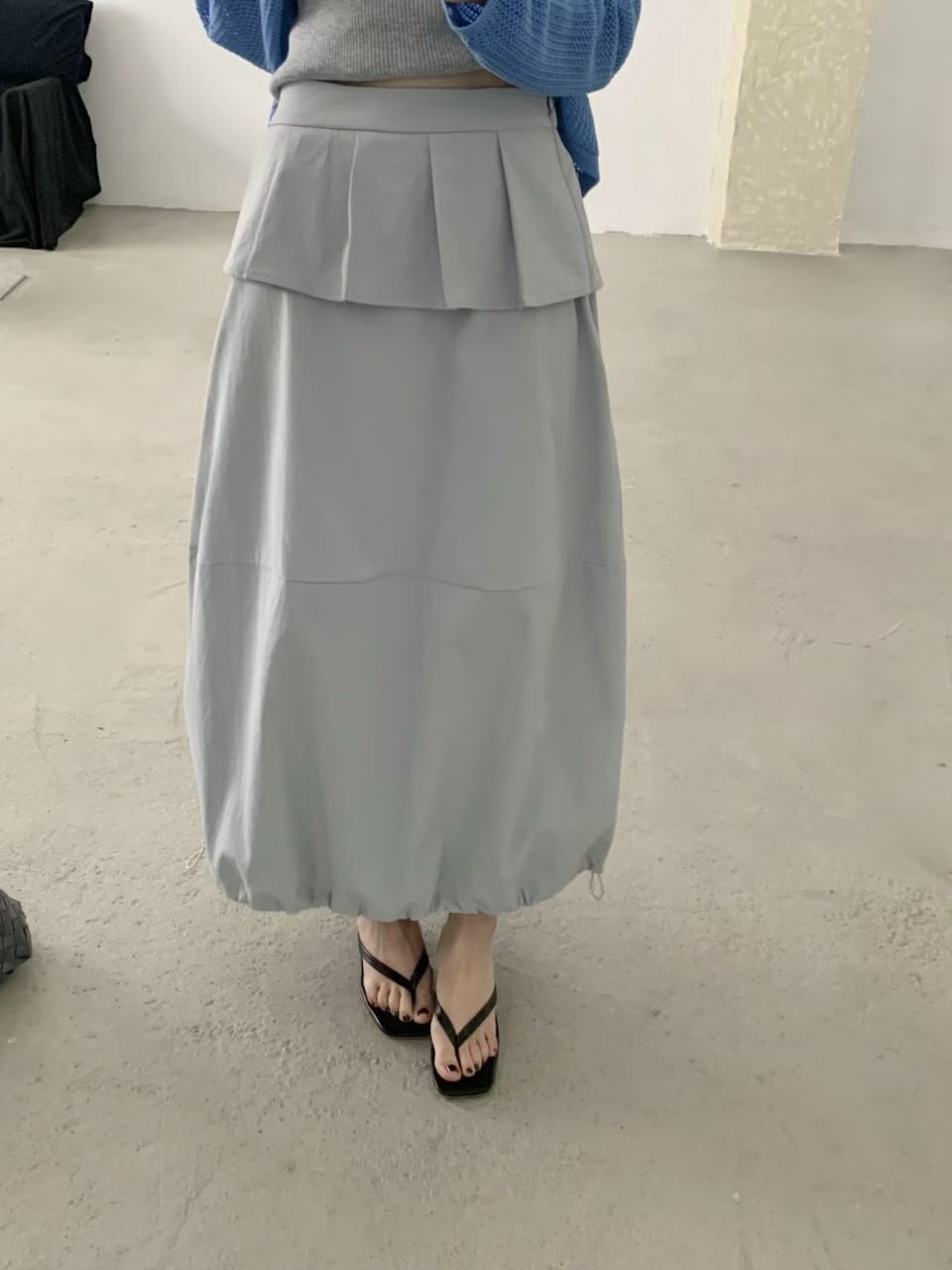 Skirt worn with accessories