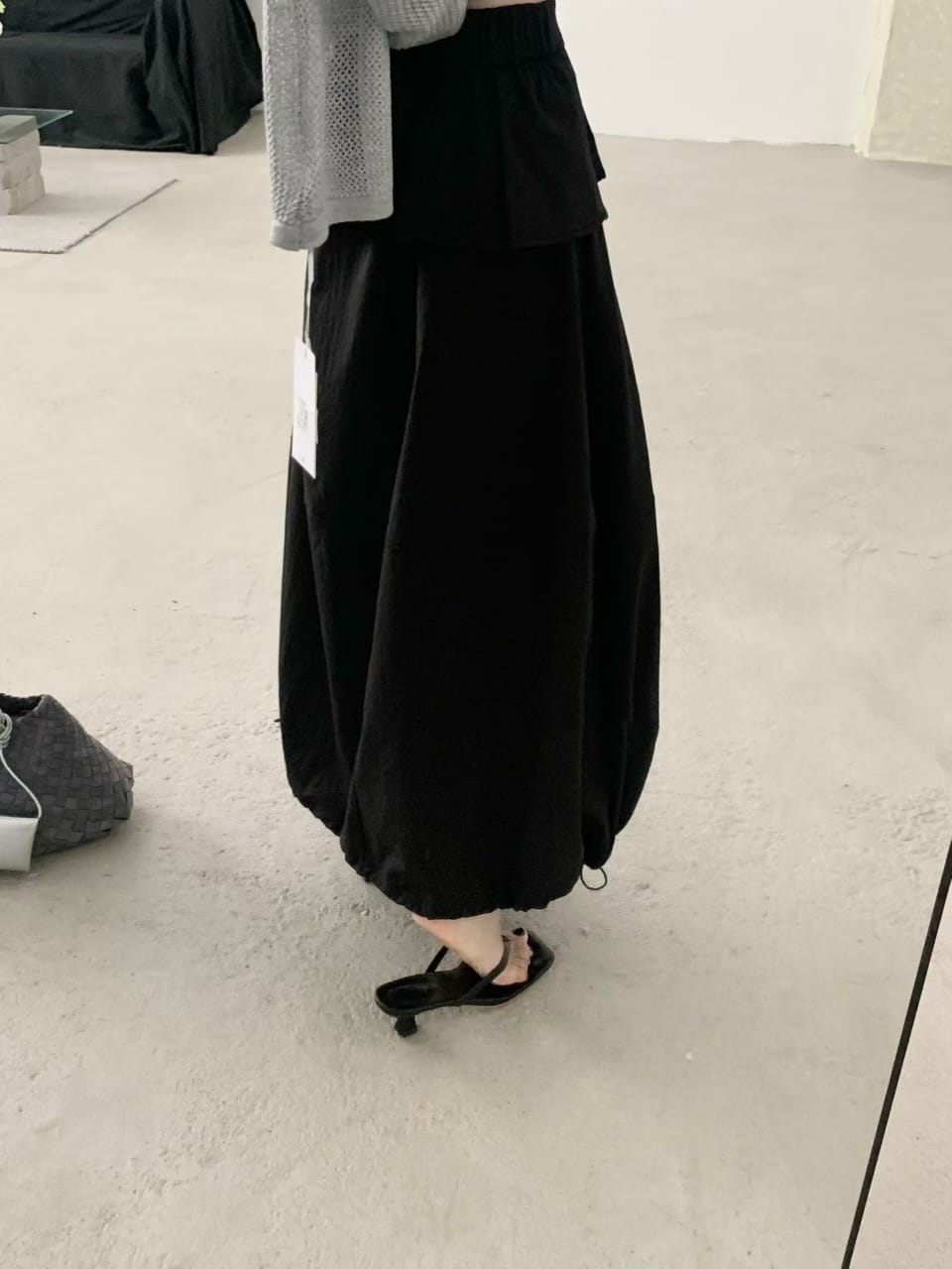 White skirt worn front view with sandals