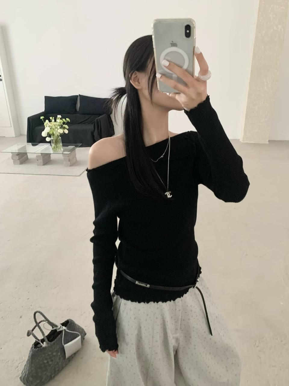 Black off-shoulder ribbed knit top - mirror selfie with grey wide-leg trousers and belt bag