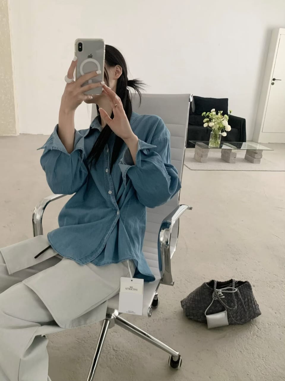 Light blue denim shirt - mirror selfie outfit shot with white trousers