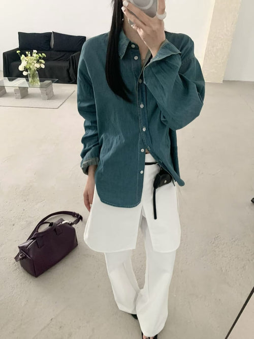 Deep teal denim shirt - full outfit mirror shot with white wide-leg pants