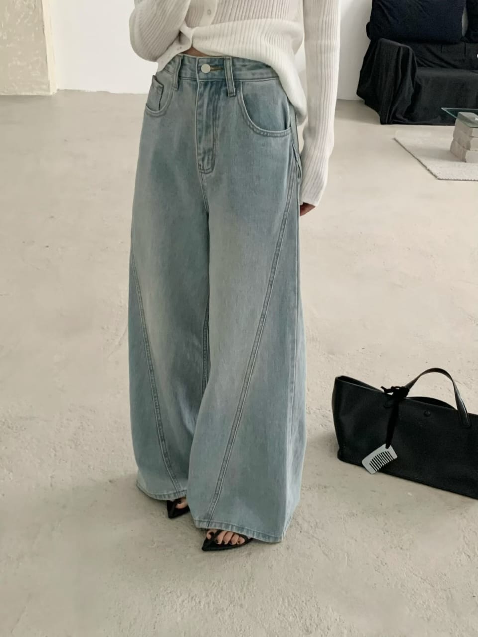 Wide-leg jeans worn with heels