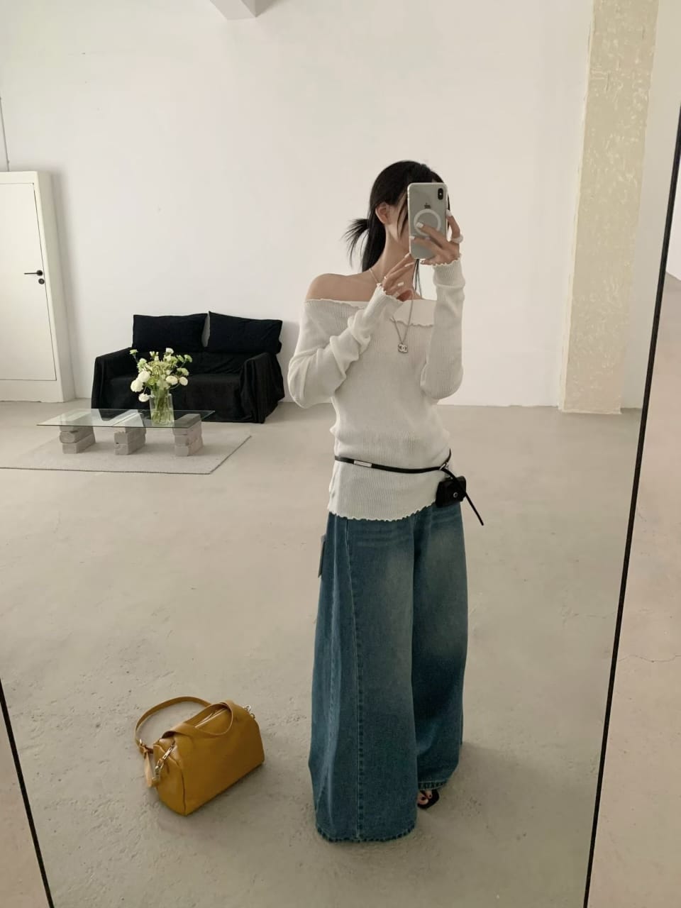 White off-shoulder ribbed knit top - full length mirror shot with wide-leg jeans